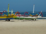 Day boats that you can rent in Sanur. Check out the faces painted on each one.